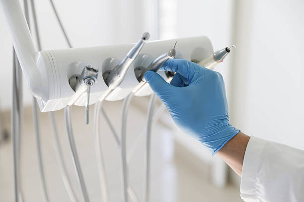 Professional Invisalign Clear Aligners technician working in Rising Sun, IN